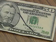 Counterfeit Money Being Passed at Yard Sales